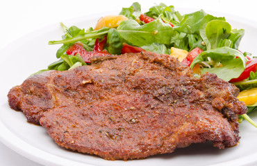 cervical chop with apricot-rocket salad