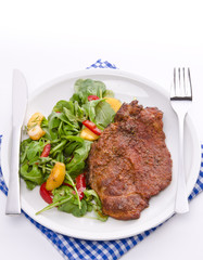 cervical chop with apricot-rocket salad