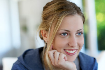 Portrait of beautiful teen girl with blue eyes