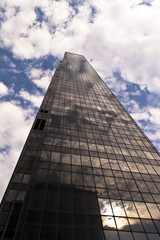 Fototapeta premium Building with cloudy sky at background