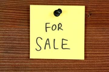 For sale - yellow paper sign