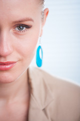 Closeup portrait of a beautiful young positive smiling woman iso