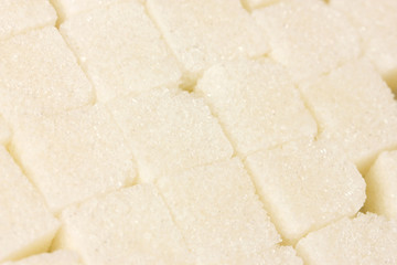 White lump sugar background close-up