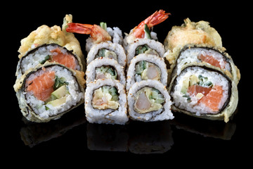 sushi set over black background