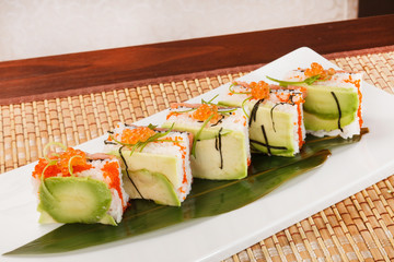 tasty sushi with avocado