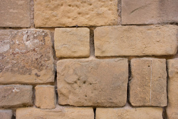 Background image of a wall of irregular square wall