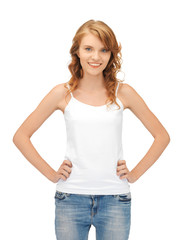 Fototapeta premium smiling teenage girl in blank white t-shirt