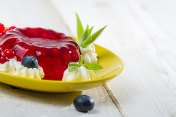 Closeup of a red jelly with fruits