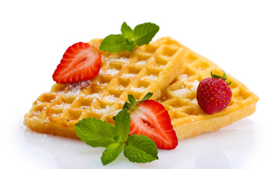 belgium waffles with strawberries and mint  isolated on white