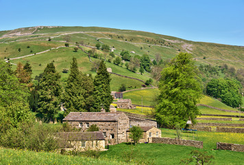Stone barns in English countryside