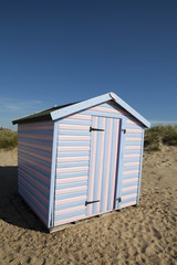 Fototapeta na wymiar Blue and Pink Beach Hut