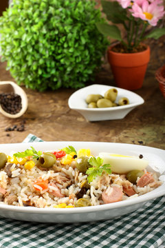 Rice salad with eggs, corn and olives