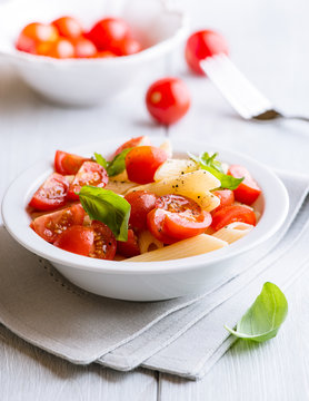 Pasta Salad With Cherry Tomatoes And Basil Leaves