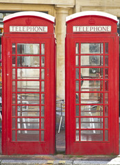 Fototapeta premium Two British red telephone boxes