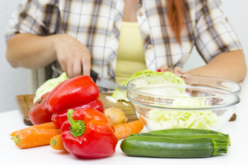 woman cutting vegetables