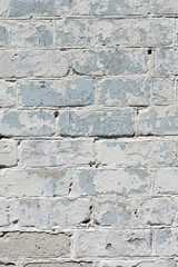 white textured brick wall painted