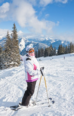 Alpine skier mountains in the background