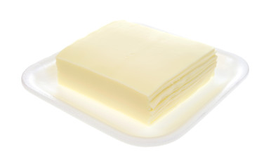 Sliced American white cheese on a foam tray