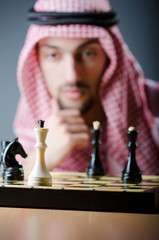 Chess player playing his game