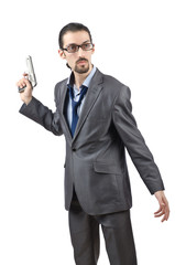 Obraz premium Businessman with gun isolated on white