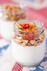 delicious and healthy yogurt and granola, fruits, nuts, grains