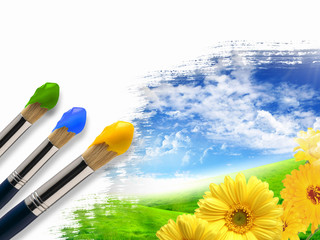 Paint brushes and landscape image