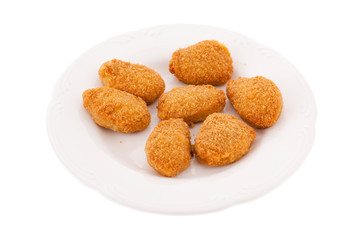 Plate of chicken nuggets isolated on white