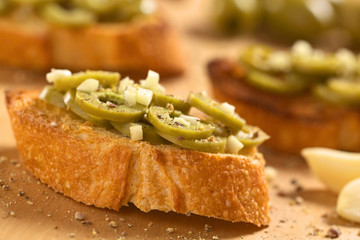 Crispy Italian antipasto, Bruschetta with olive and garlic
