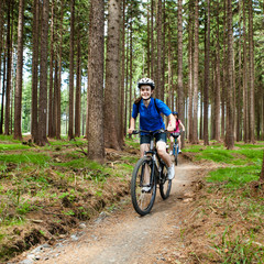 Obraz premium Girls riding bikes