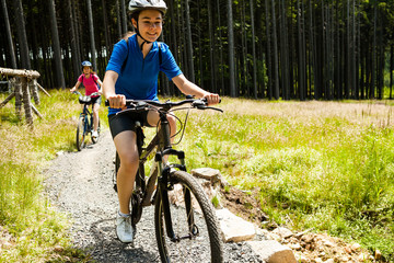 Obraz premium Girls riding bikes