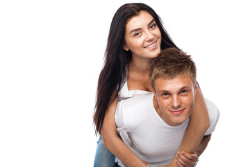 Obraz premium Happy young couple in casual clothing