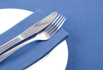 Cutlery on red napkin