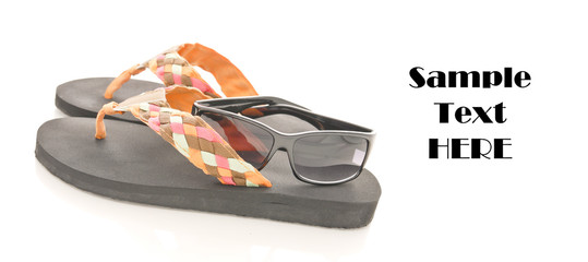 Flip Flops and Sun Glasses with Space for Text on white