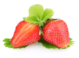 sweet ripe strawberries with leaves isolated on white