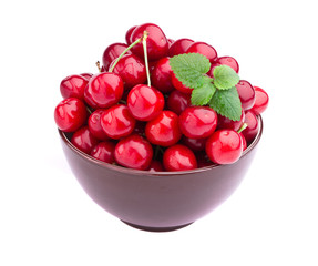 Sweet cherry fruits in brown bowl