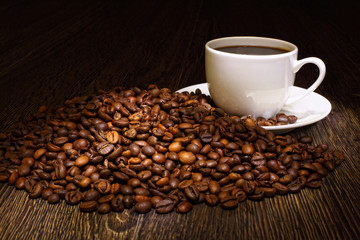 Coffee beans and white cup