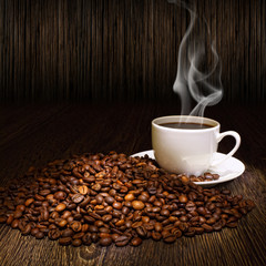 Coffee beans and white cup