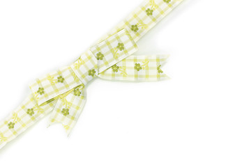 beautiful green bow and ribbon isolated on white.