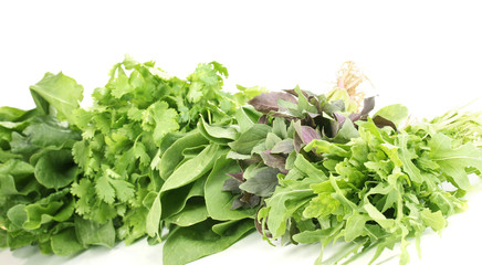 Fresh herbs isolated on white