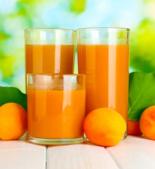 glasses of apricot juice  and fresh apricots