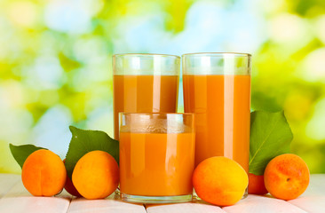 glasses of apricot juice  and fresh apricots
