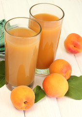 glasses of apricot juice  and fresh apricots