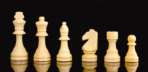 Chess pieces isolated on black