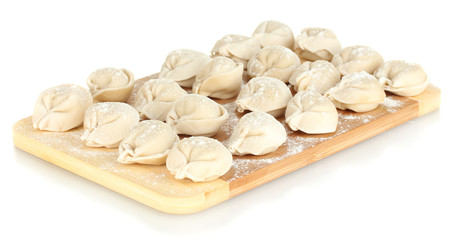 Raw Dumplings on cutting board isolated on white
