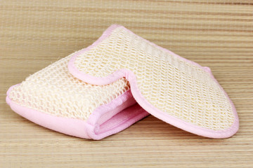 Sponges for bathing on bamboo background