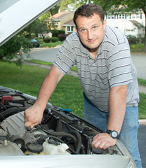 Fototapeta na wymiar Mechanic fixing car