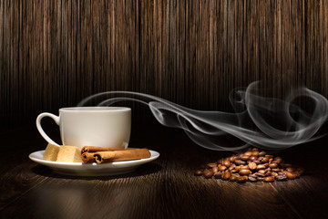 Coffee beans and white cup