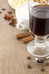 cup of coffee with roasted beans