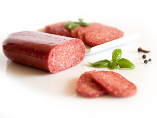 salami slices isolated on white