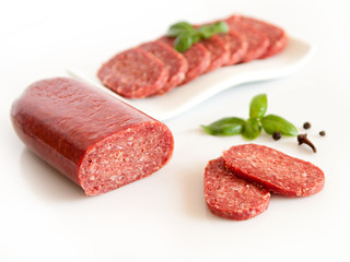 salami slices isolated on white